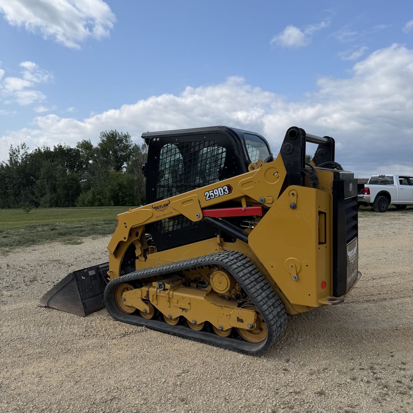 Outlaw's CAT 259D3 compact track loader on a jobsite
